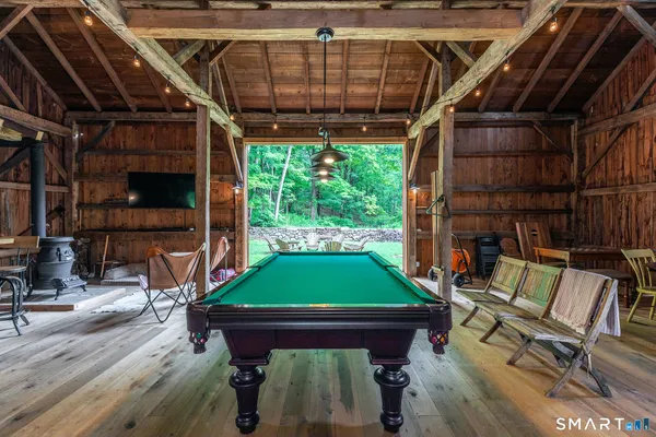 a room with furniture and a fireplace