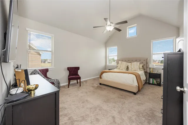 a bedroom with a bed and furniture