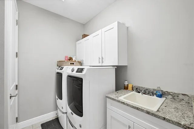 a bathroom with a sink and mirror