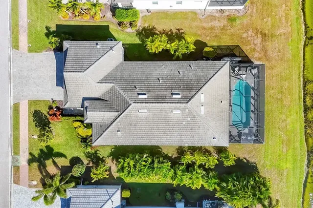 a view of a swimming pool with a patio