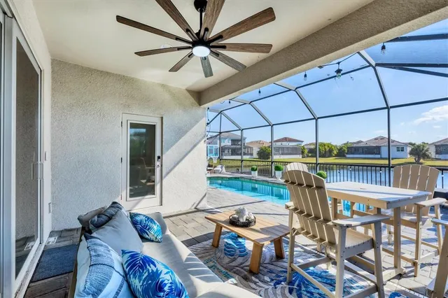 a view of a backyard with sitting area