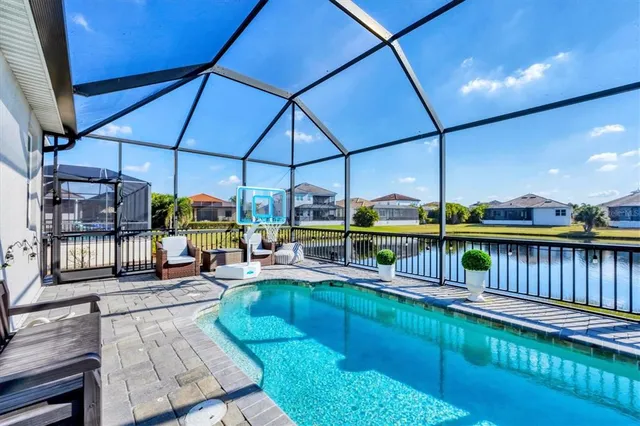 a view of a golf course with a lake