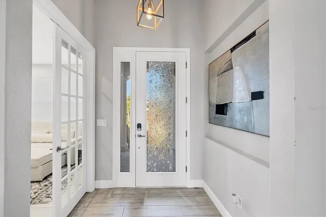 a view of a bathroom from the hallway