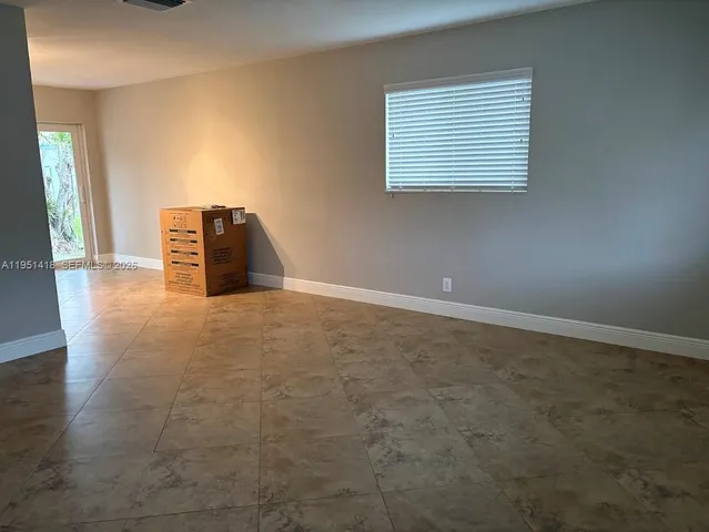 a view of a room with a window