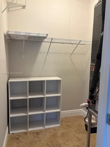 a view of a room with rack on the wall