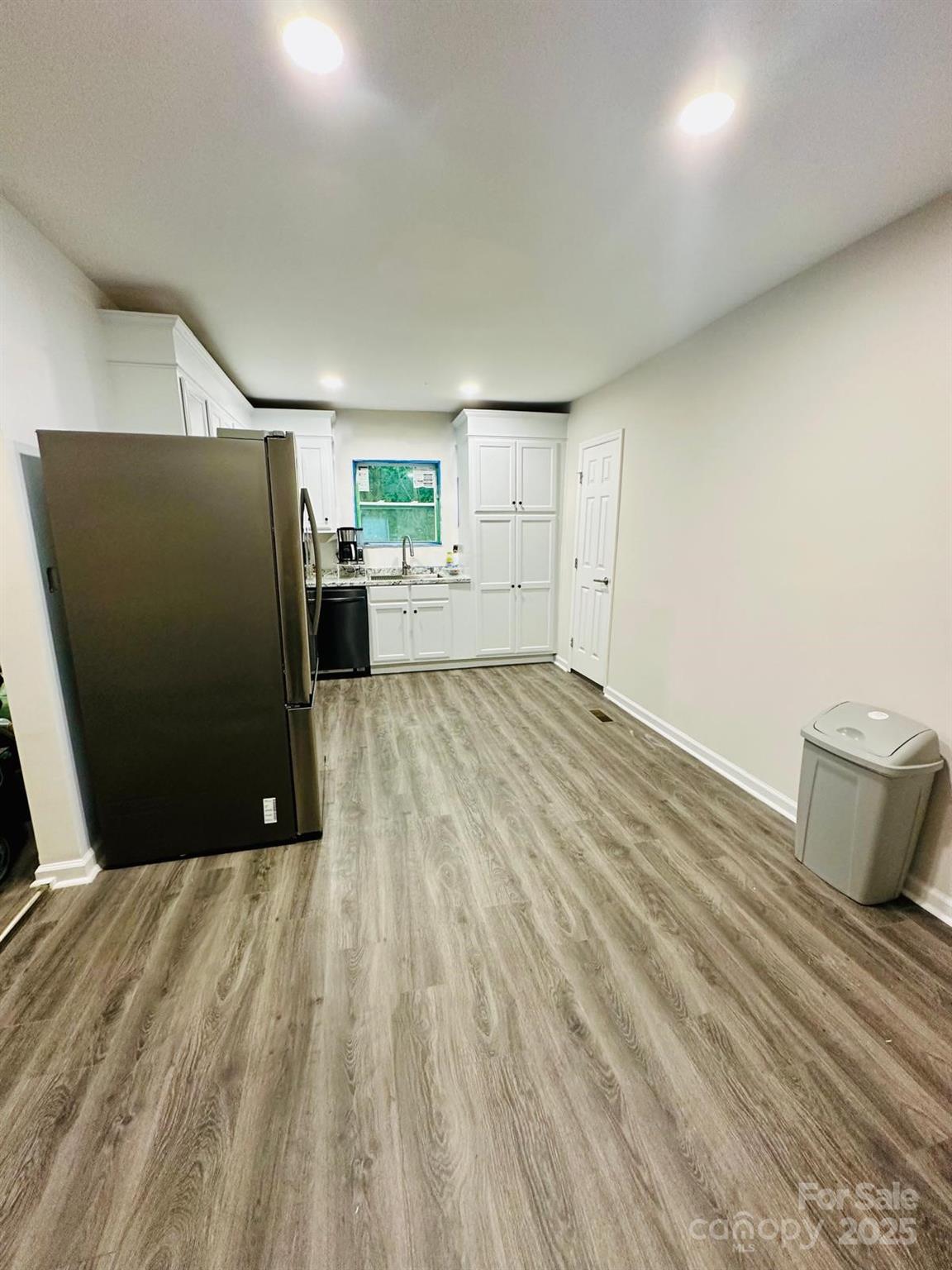 1010 13th Street, Unit 11 Lancaster, SC 29720 - Photo 11 of 22 a view of a hardwood floor in a room
