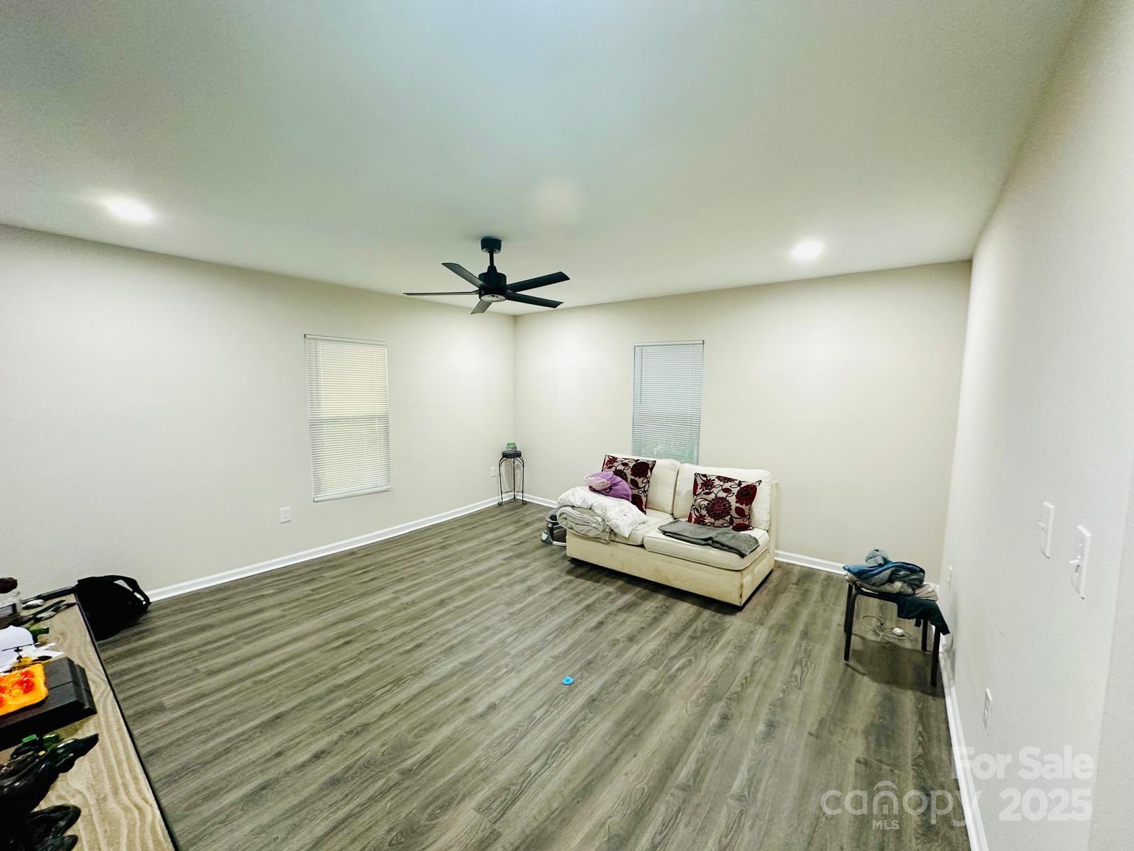1010 13th Street, Unit 11 Lancaster, SC 29720 - Photo 3 of 22 a living room with furniture and wooden floor