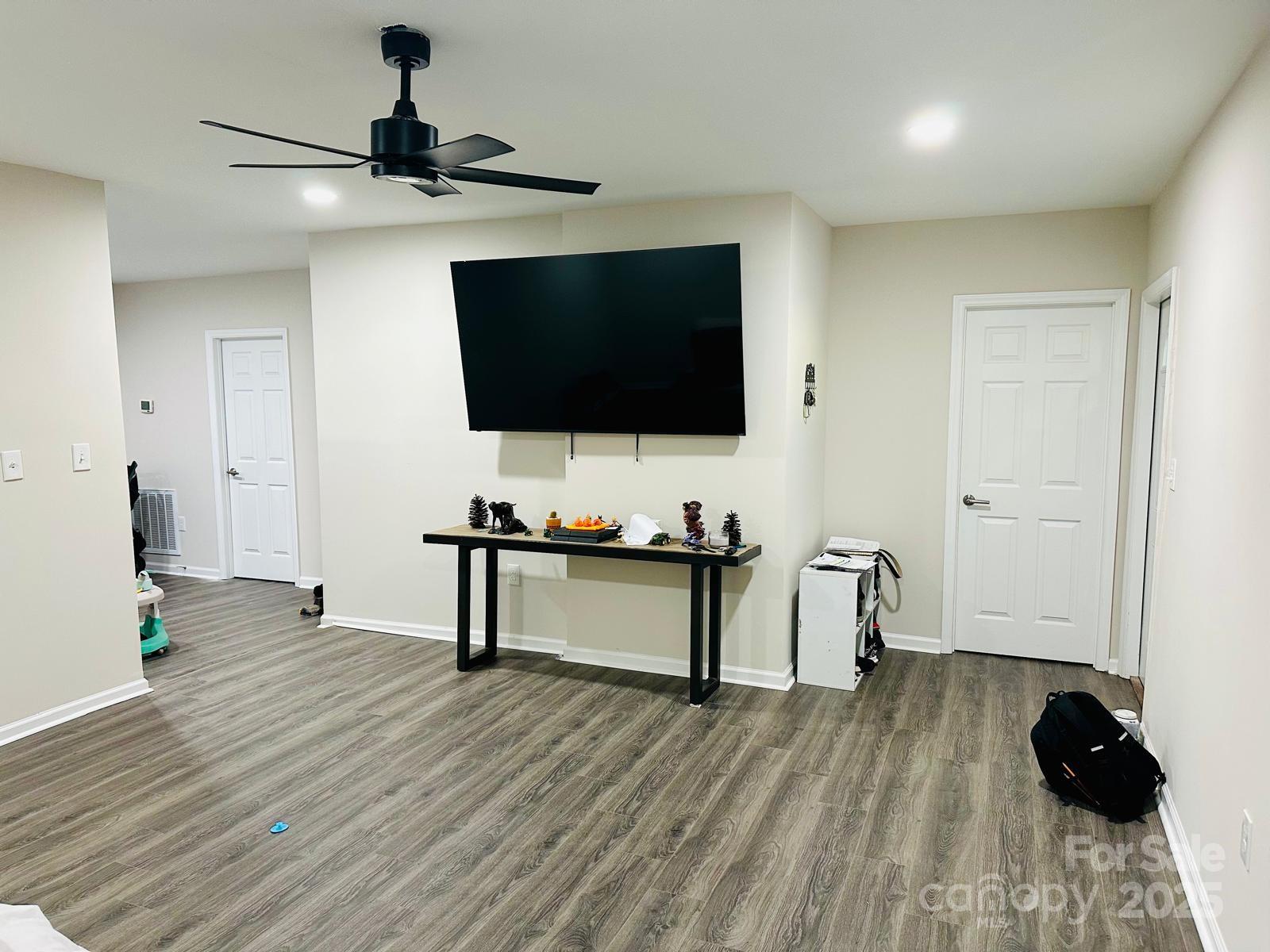1010 13th Street, Unit 11 Lancaster, SC 29720 - Photo 4 of 22 a living room with furniture and a flat screen tv