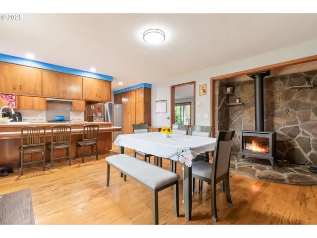 a view of a dining room with furniture window and outside view