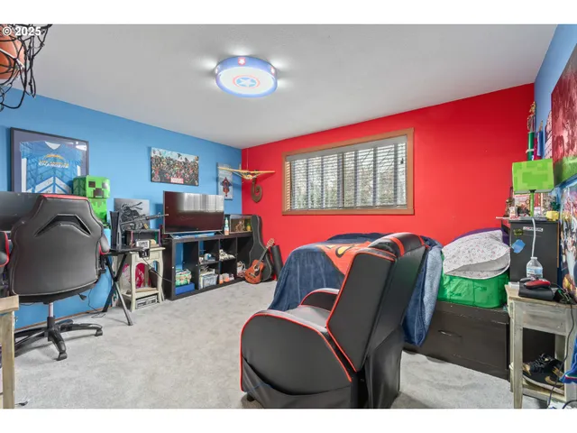 a bedroom with a bed and dresser