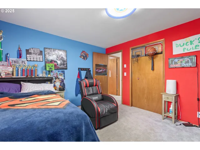 a bedroom with furniture and a bed