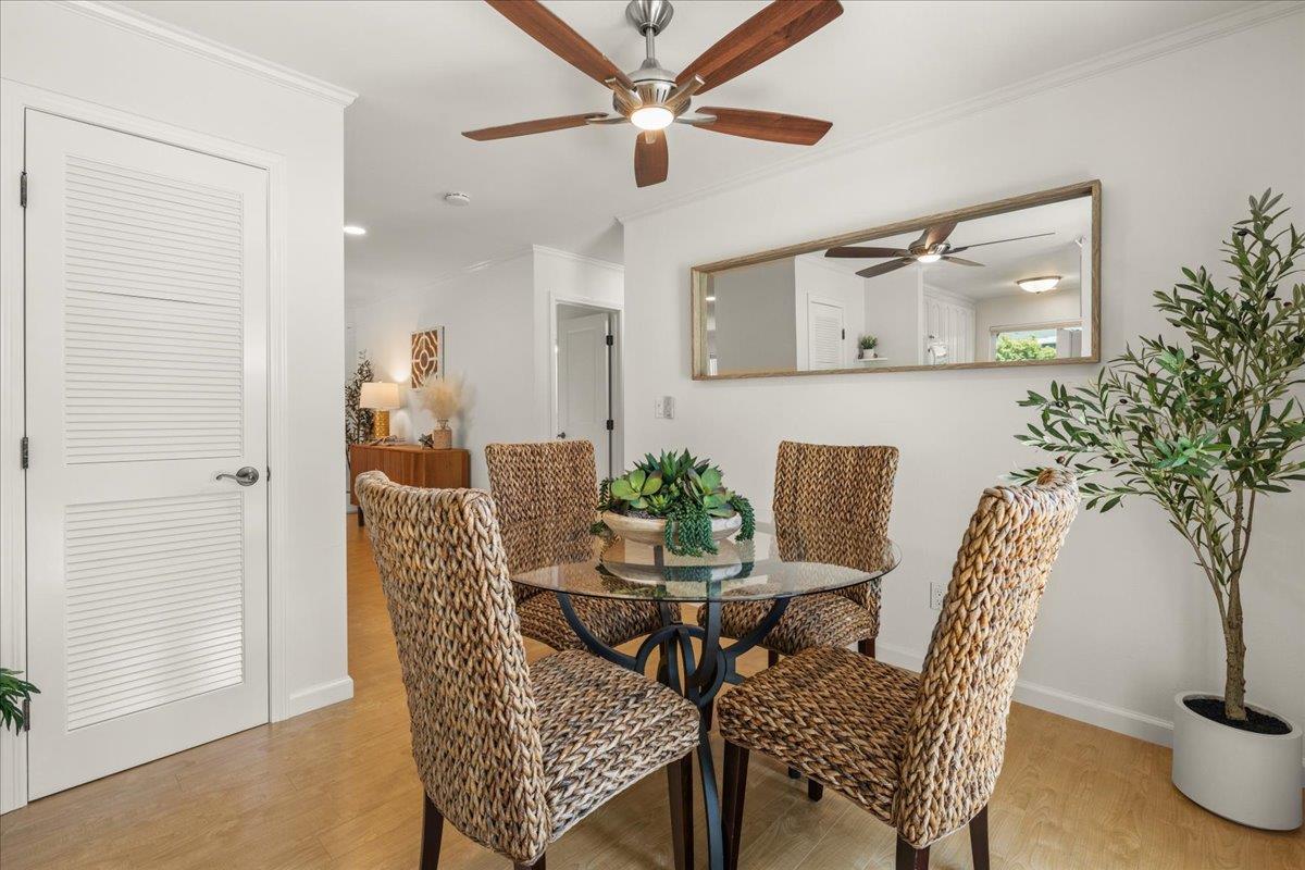 115 Hames Road Watsonville, CA 95076 - Photo 12 of 32 a view of a dining room with furniture and a potted plant