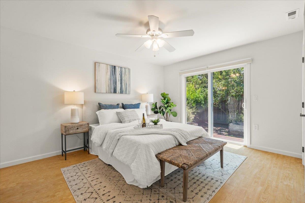 115 Hames Road Watsonville, CA 95076 - Photo 18 of 32 a bedroom with a bed and a large window