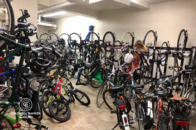 a group of cars parked in a garage