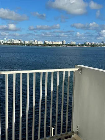 a view of a balcony with an outdoor space