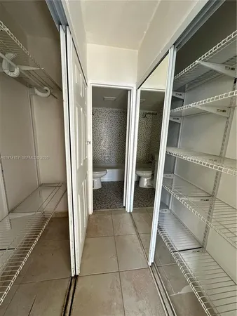 a view of a walk in closet