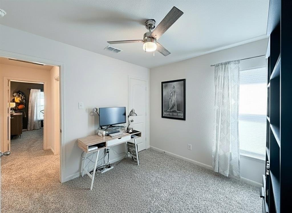 13507 Granite Park Road Ponder, TX 76259 - Photo 21 of 28 a workspace with a table and chairs