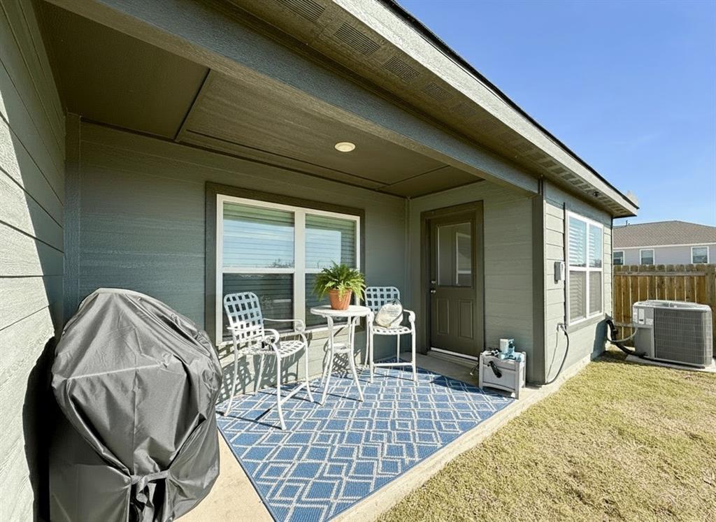 13507 Granite Park Road Ponder, TX 76259 - Photo 24 of 28 a view of living room and patio