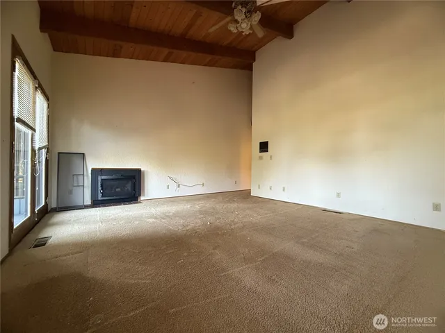 an empty room with windows