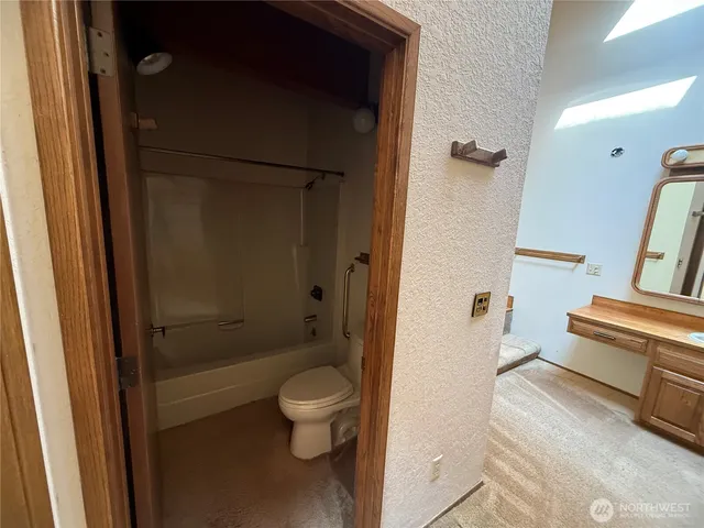 a view of a kitchen with a sink
