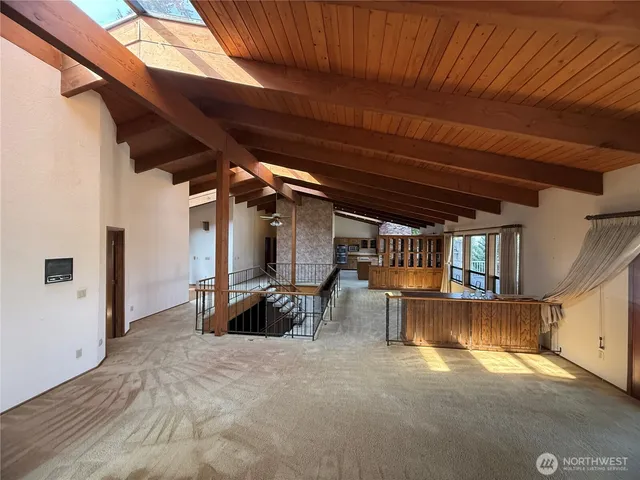a view of kitchen with wooden floor and window