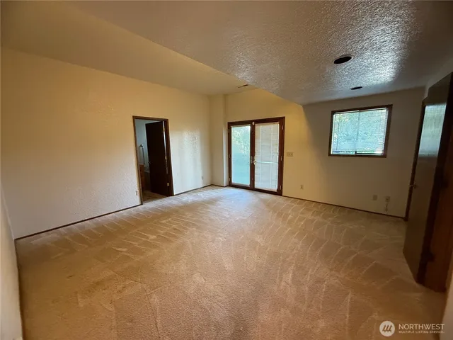 a kitchen with a wooden floor
