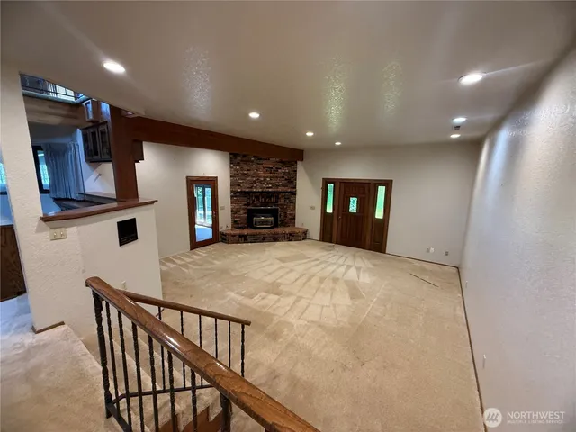 a view of a livingroom with a fireplace