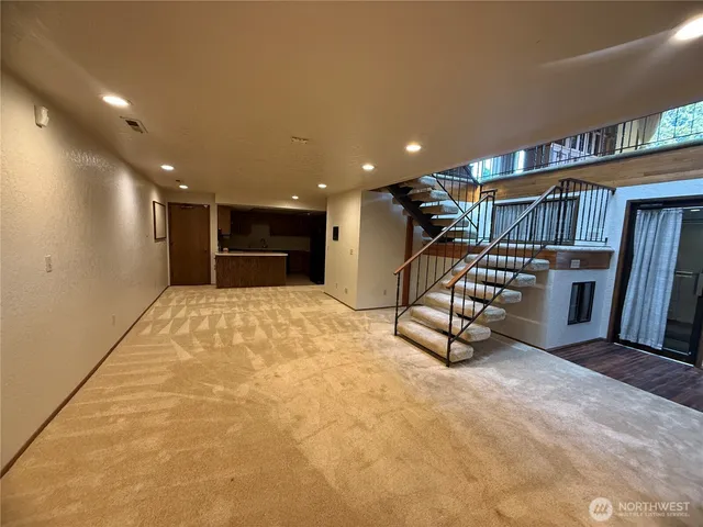 a kitchen with a sink and a window