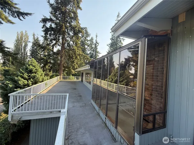 a view of a backyard of the house