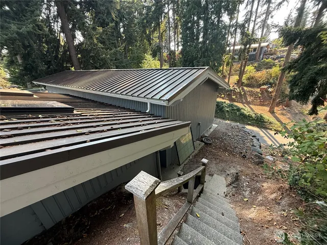 a backyard of a house with lots of green space