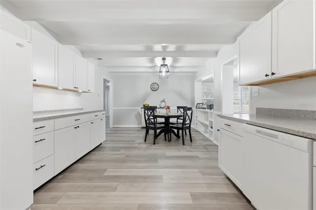 a view of a dining room with furniture