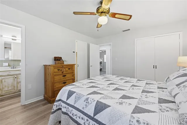 a bedroom with a bed and a dresser