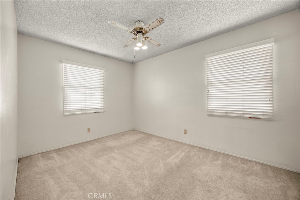 12342 Rea Circle Garden Grove, CA 92841 - Photo 14 of 27 a view of an empty room with a window