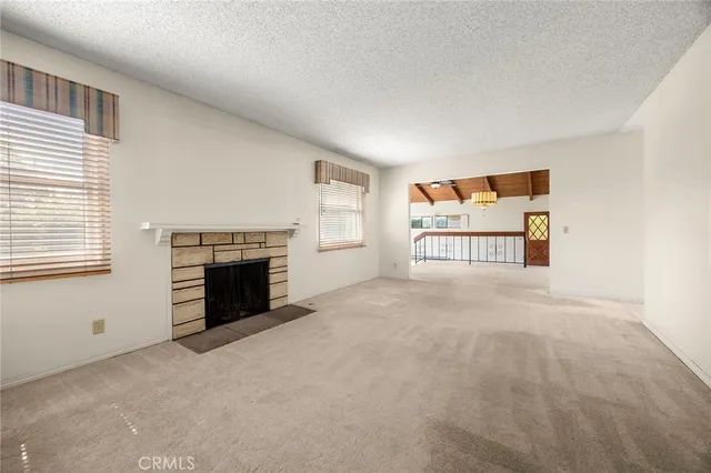 a view of a livingroom with a fireplace