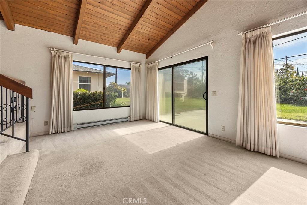12342 Rea Circle Garden Grove, CA 92841 - Photo 5 of 27 a view of empty room with floor to ceiling window