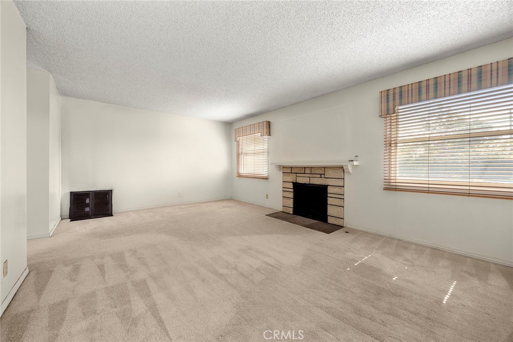 12342 Rea Circle Garden Grove, CA 92841 - Photo 7 of 27 a view of an empty room with a window