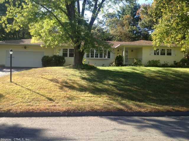 130 Fox Den Road Bristol, CT 06010 - Photo 1 of 1 a front view of a house with a garden