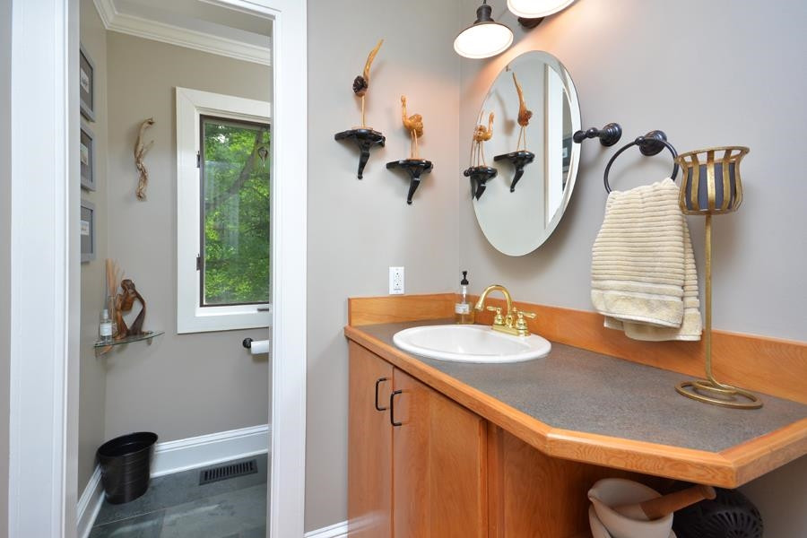 544 Lockamy Road Timberlake, NC 27583 - Photo 20 of 47 a bathroom with a sink and a mirror