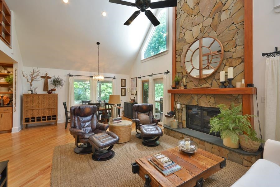 544 Lockamy Road Timberlake, NC 27583 - Photo 10 of 47 a living room with furniture and a fireplace