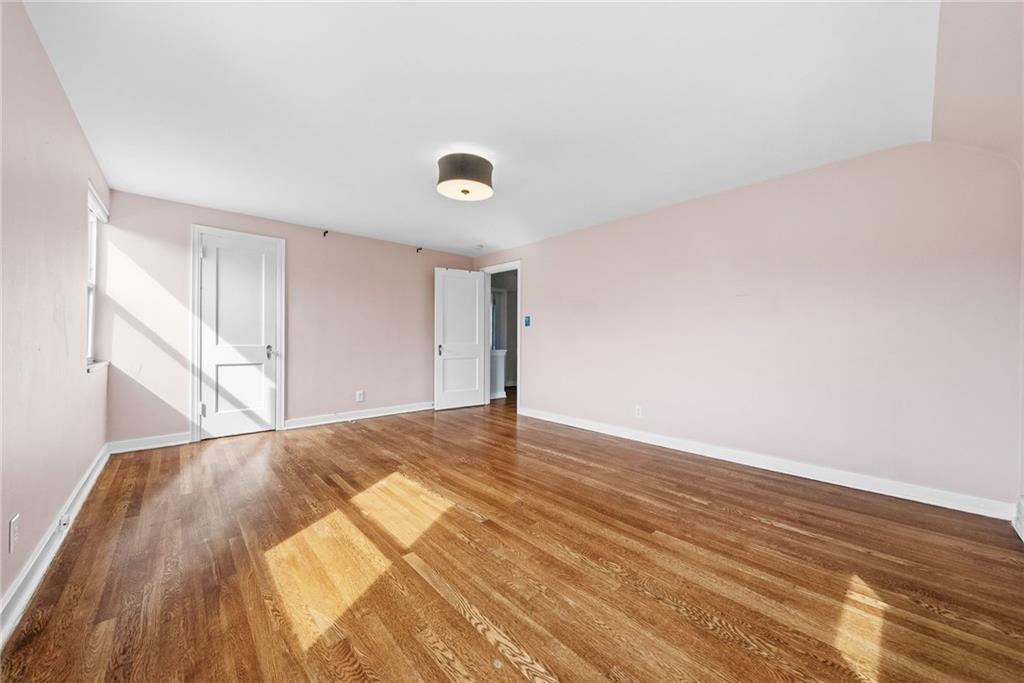 8 Allendale Place Pittsburgh, PA 15228 - Photo 23 of 34 a view of an empty room and wooden floor