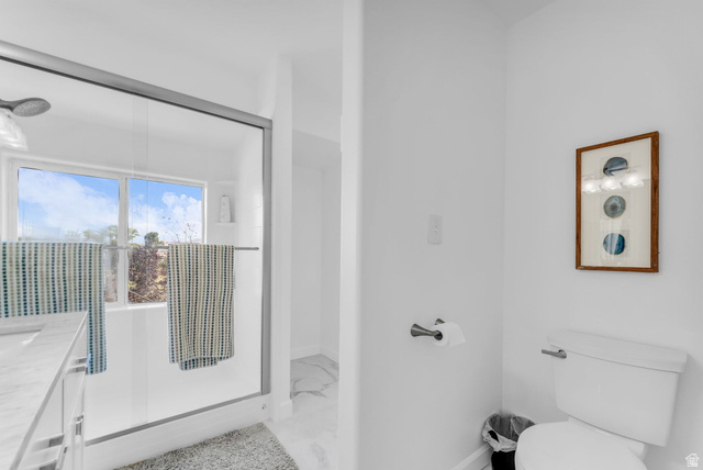 1147 West State Road Lehi, UT 84043 - Photo 20 of 31 Shower enclosure with clear glass doors and a chrome shower head