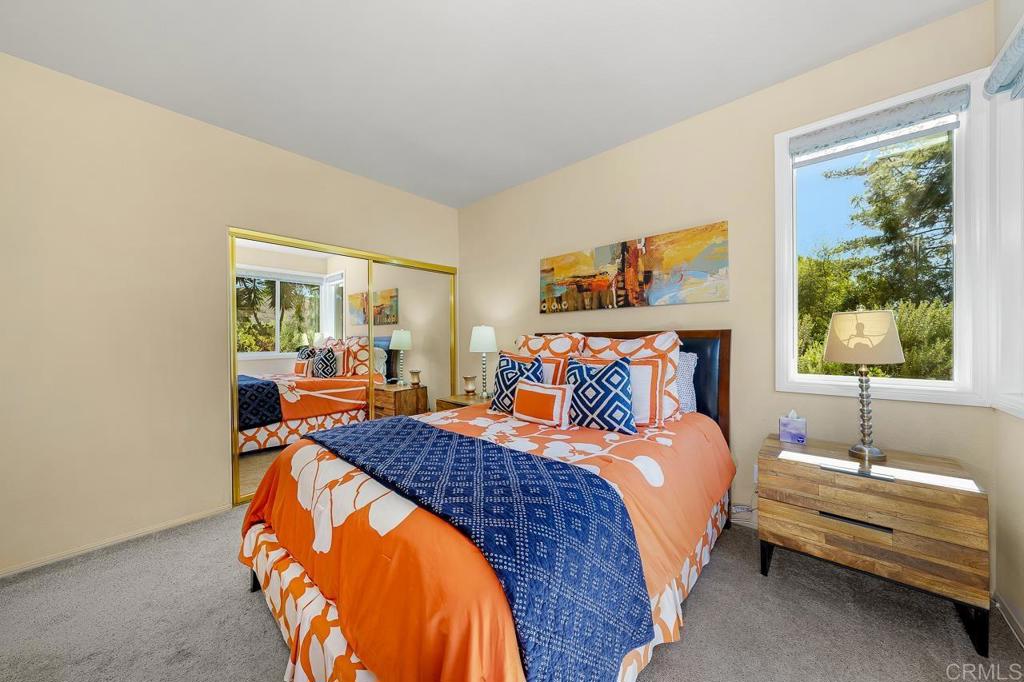 3762 Hidden Ridge Road Jamul, CA 91935 - Photo 17 of 29 a bedroom with a bed and window