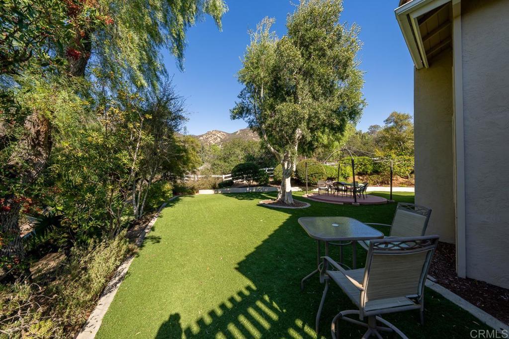 3762 Hidden Ridge Road Jamul, CA 91935 - Photo 23 of 29 a view of a swimming pool and lounge chairs