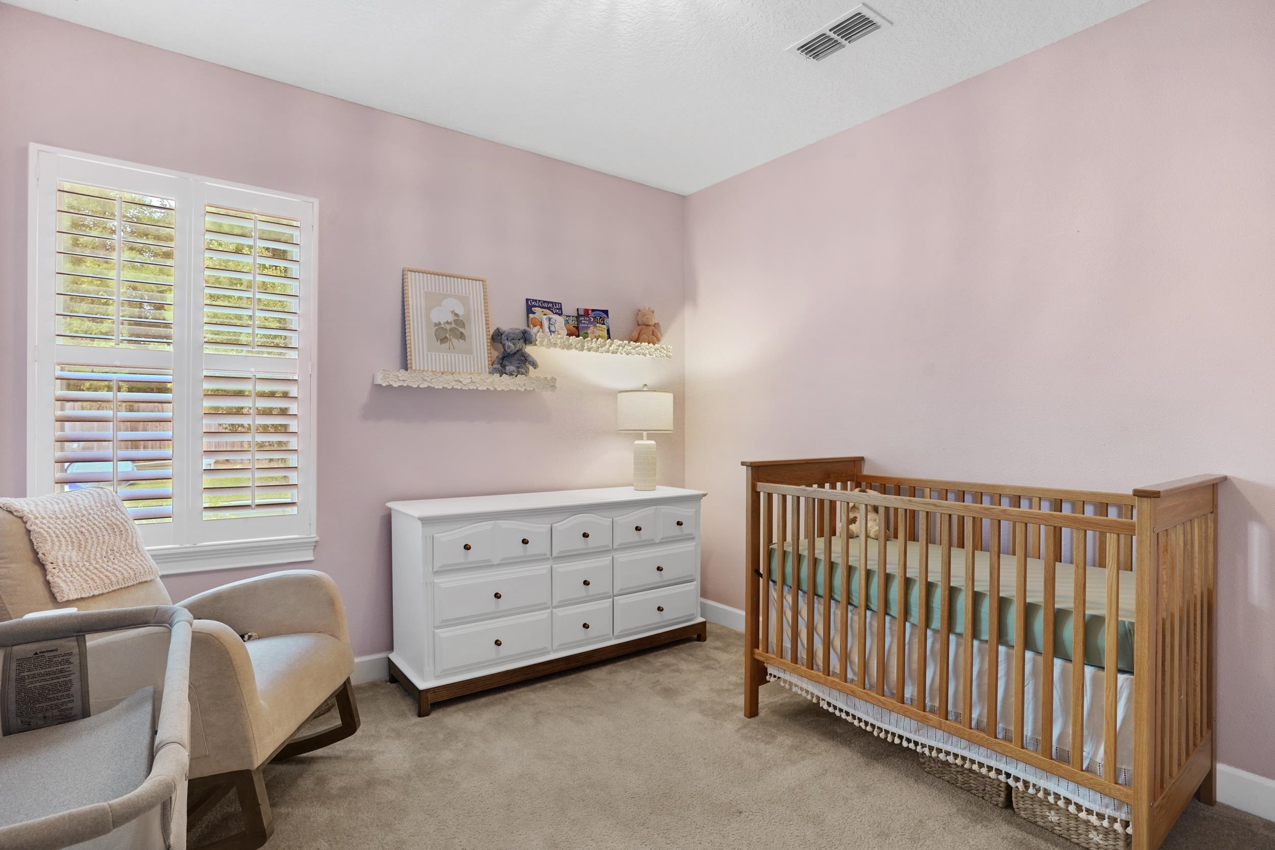 1308 Acorn Ridge Court St. Augustine, FL 32092 - Photo 29 of 47 a view of a bedroom with furniture and windows