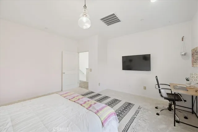 a view of bathroom with a potted plant