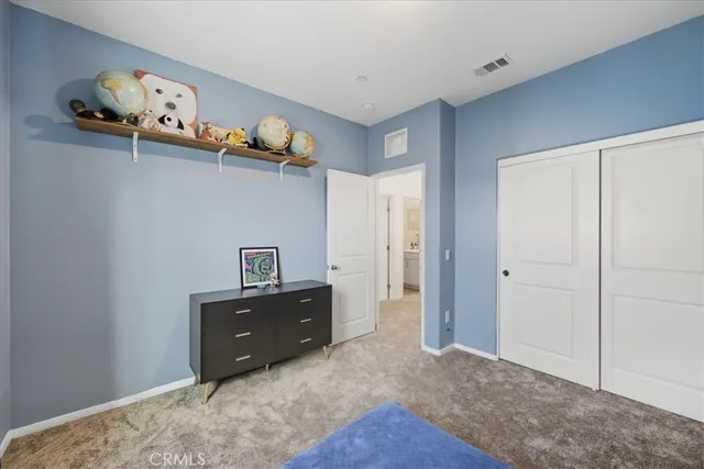 a view of a patio with a chairs and table in a patio