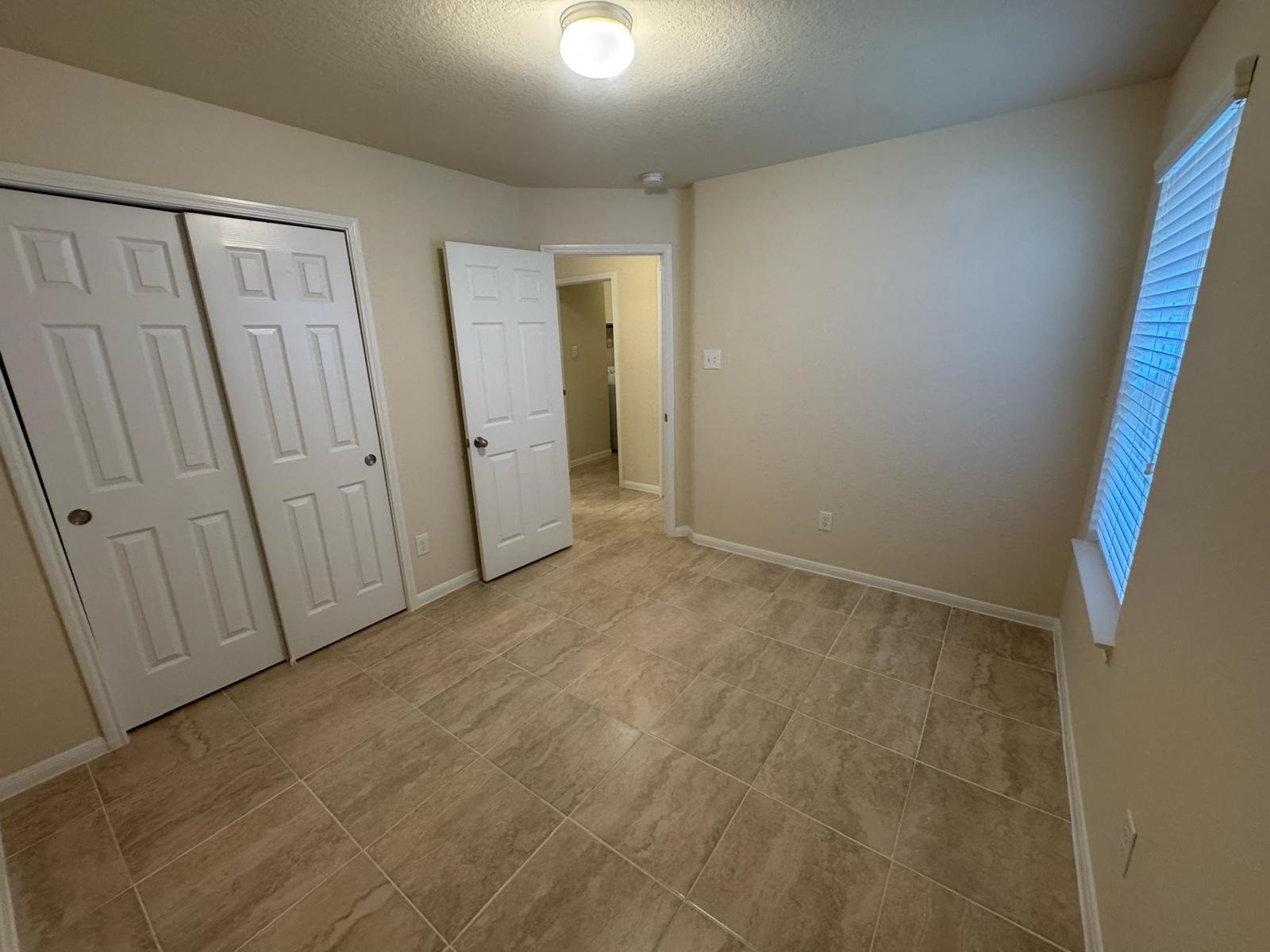 18323 Spruce Tree Line Trail Houston, TX 77084 - Photo 17 of 17 a view of an empty room