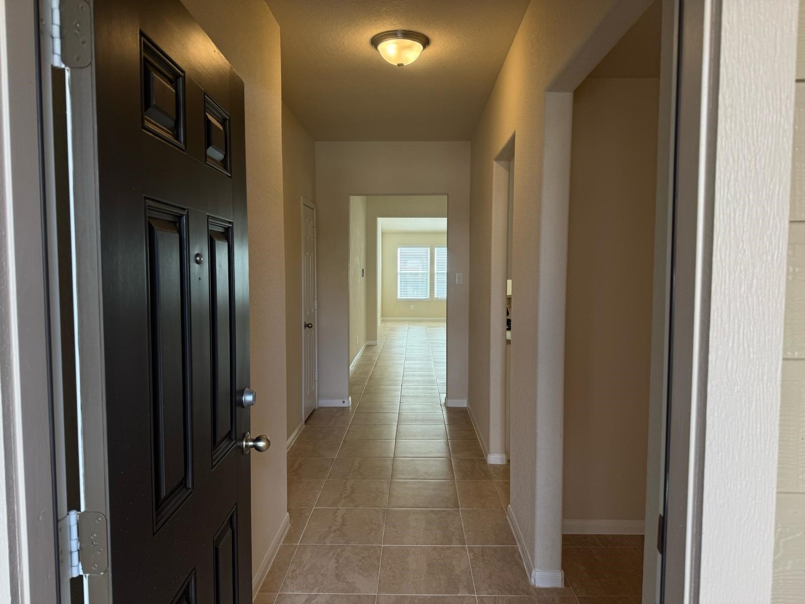 18323 Spruce Tree Line Trail Houston, TX 77084 - Photo 4 of 17 a view of a hallway with wooden floor