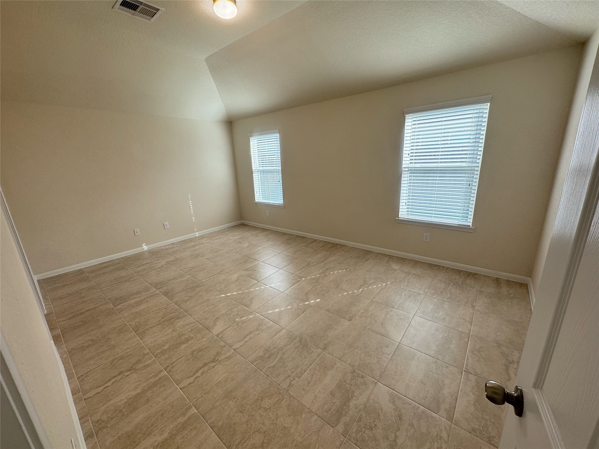 18323 Spruce Tree Line Trail Houston, TX 77084 - Photo 10 of 17 a view of an empty room with a window