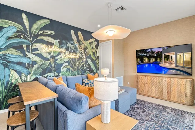 a outdoor dining space with furniture and outdoor view